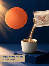 A sachet of Premenstrual Tea being stirred into a cup of hot water